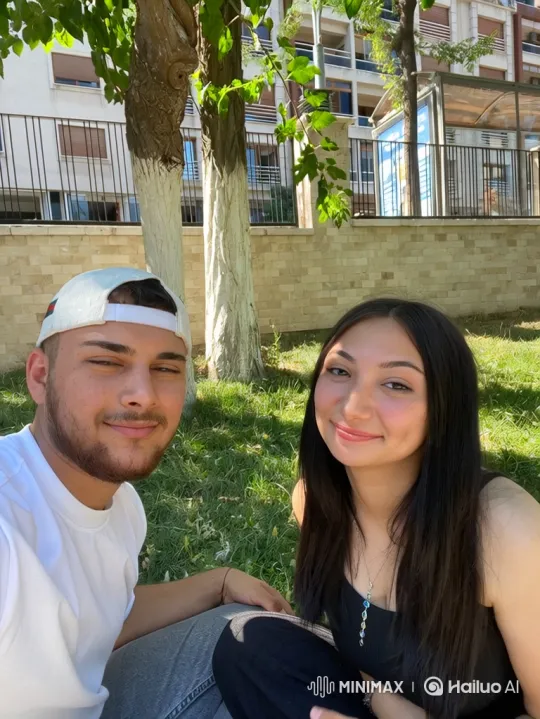Family Embrace on a Sunny Grass Field – AI Generated Video | Hailuo AI