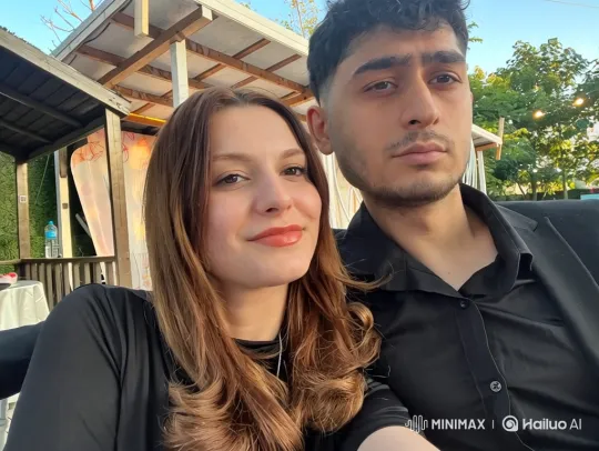 Family Embrace in Gazebo Captured on Phone – AI Generated Video | Hailuo AI