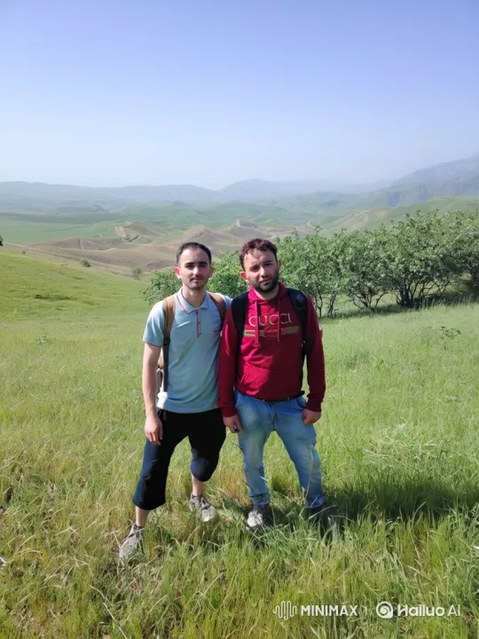 Two Men Flee from Approaching Bear on Hillside – AI Generated Video | Hailuo AI