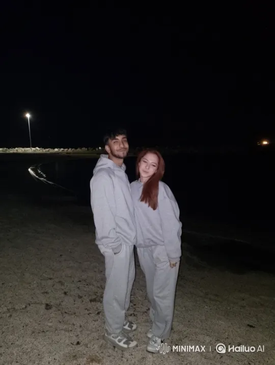 Family Embrace on a Night Beach – AI Generated Video | Hailuo AI