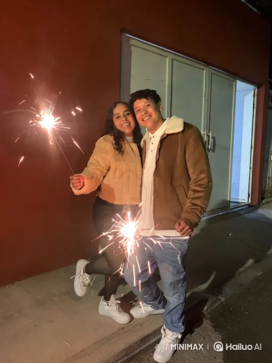 Family Embrace with Sparklers at Night – AI Generated Video | Hailuo AI