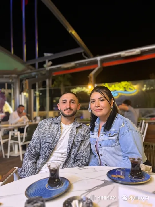 Young Family Shares Loving Moment at Summer Party – AI Generated Video | Hailuo AI
