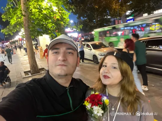 Family Embrace on a Bustling City Street – AI Generated Video | Hailuo AI