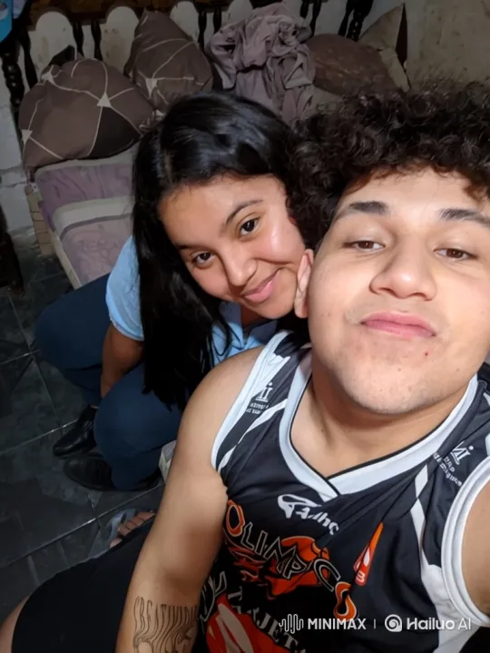 Young Family Embraces in Cozy Room – AI Generated Video | Hailuo AI