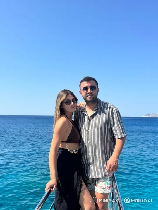 Family Embraces on Boat with Sea in Background – AI Generated Video | Hailuo AI