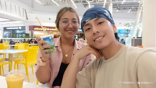 Realistic Family Scene in Food Court with Subtle Movements – AI Generated Video | Hailuo AI