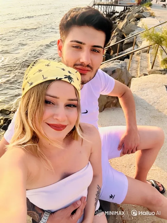 Family Embraces on Seaside During Summer Evening – AI Generated Video | Hailuo AI