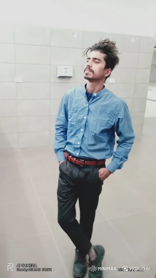 Young Man Walking Confidently in Hallway – AI Generated Video | Hailuo AI