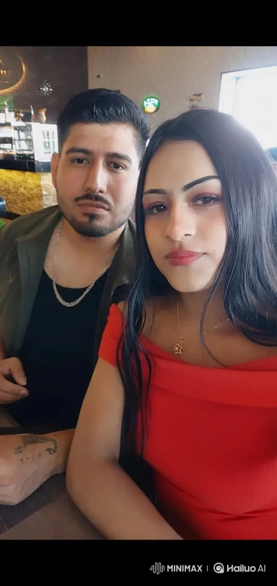 Family Portrait: Couple and Daughter in Cozy Restaurant – AI Generated Video | Hailuo AI