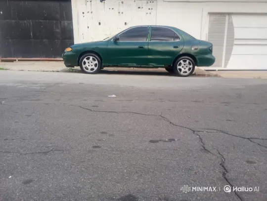 Green Sedan's Slow Descent with Lowered Suspension – AI Generated Video | Hailuo AI