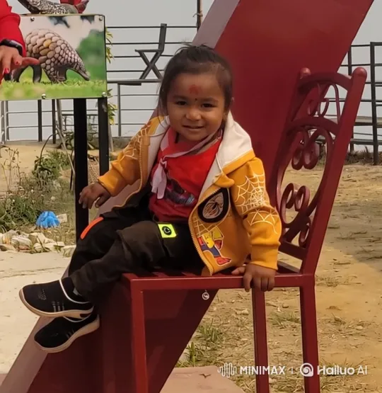 Child in Red Chair: Park Scene Exploration – AI Generated Video | Hailuo AI