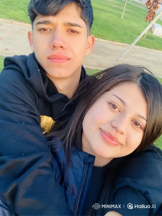 Young Family Embraces in Sunlit Park – AI Generated Video | Hailuo AI