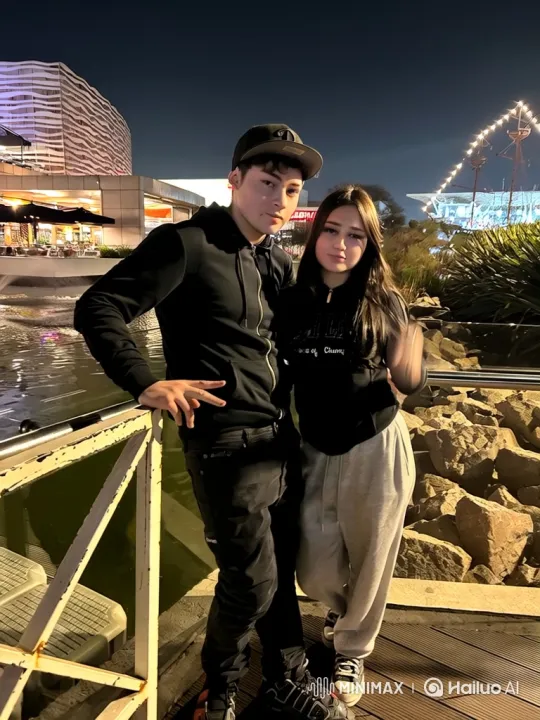 Family Embrace on Nighttime Walkway – AI Generated Video | Hailuo AI
