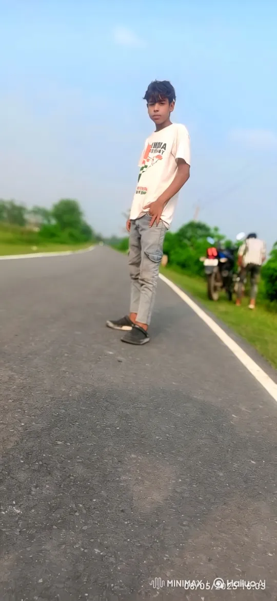 Young Man Reflects on Empty Road in Thoughtful Moment – AI Generated Video | Hailuo AI