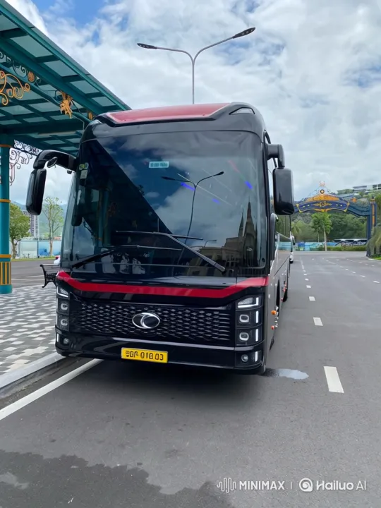 Black Bus Performs Dramatic Wheelie on Modern Road – AI Generated Video | Hailuo AI