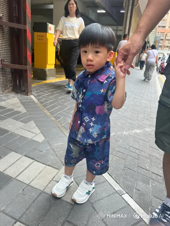 East Asian Boy Has Tantrum on Sidewalk – AI Generated Video | Hailuo AI