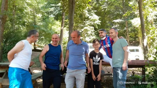 Group Shares Embraces in Sunlit Forest Gathering – AI Generated Video | Hailuo AI