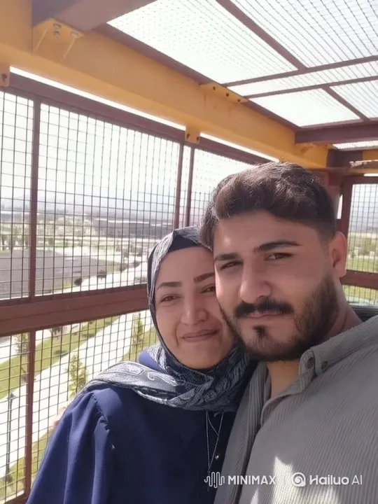 Affectionate Family Moment with Scenic Mountain View – AI Generated Video | Hailuo AI