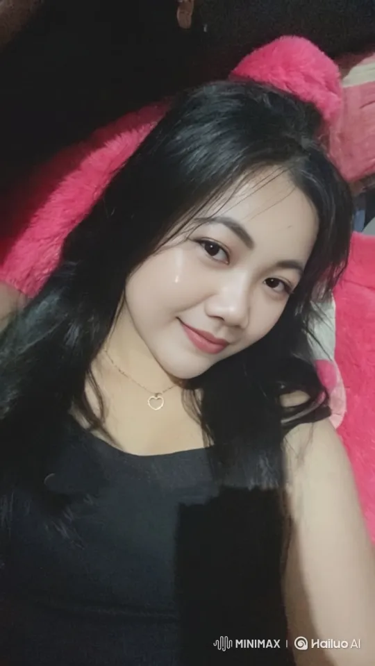 Young Woman with Playful Wink and Warm Smile – AI Generated Video | Hailuo AI