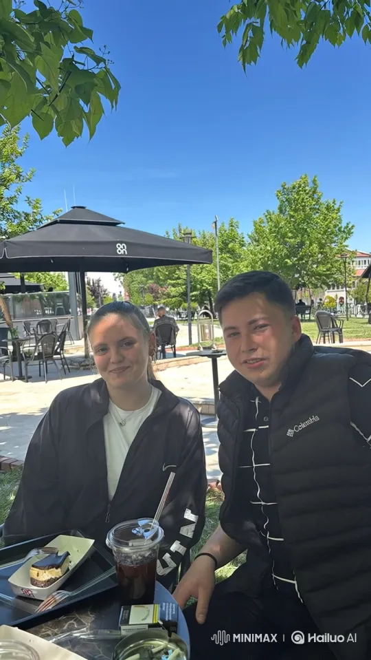 Heartwarming Family Moment at Outdoor Café – AI Generated Video | Hailuo AI