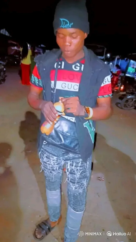 Young Person Examines Object in Night Setting – AI Generated Video | Hailuo AI