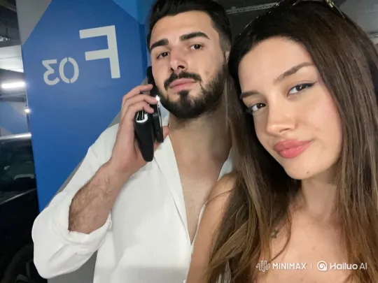 Family Embraces in Parking Garage Selfie – AI Generated Video | Hailuo AI