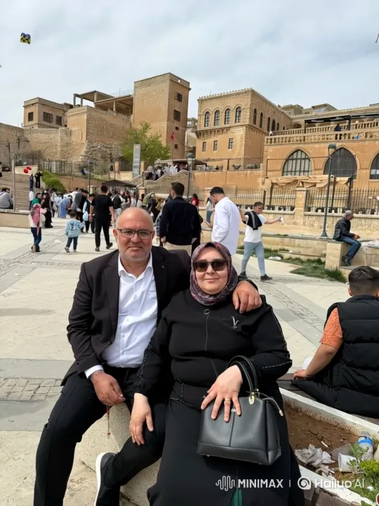 Family Embraces in Bustling Plaza Square – AI Generated Video | Hailuo AI