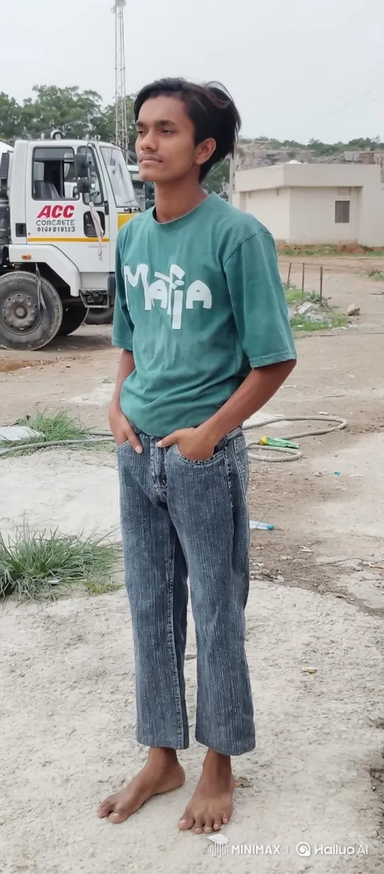 Young Man in Thoughtful Stance Amid Industrial Scene – AI Generated Video | Hailuo AI