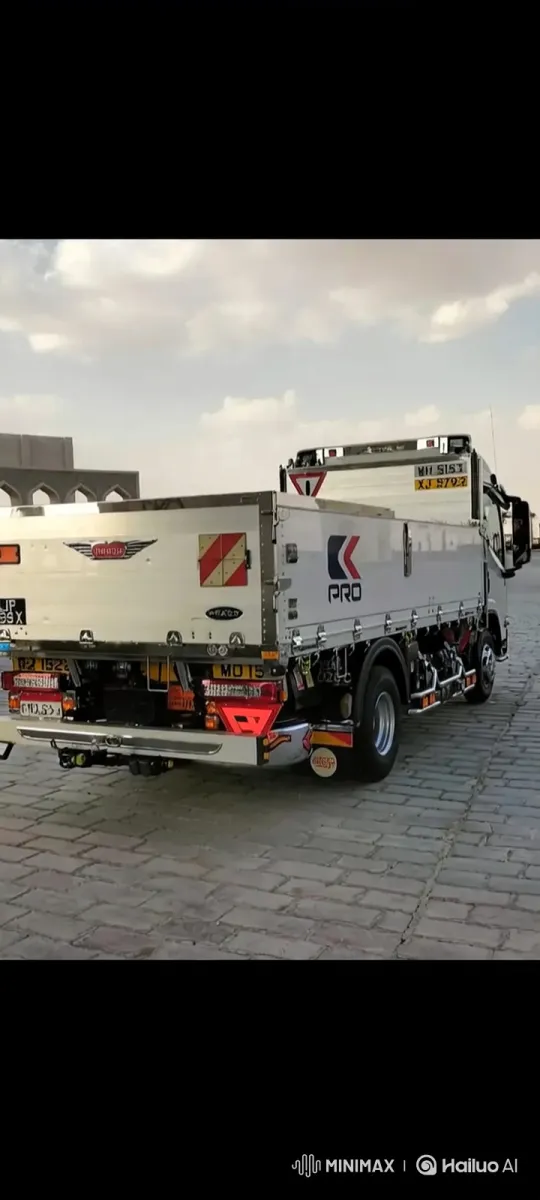 Custom White Flatbed Truck on Paved Lot – AI Generated Video | Hailuo AI