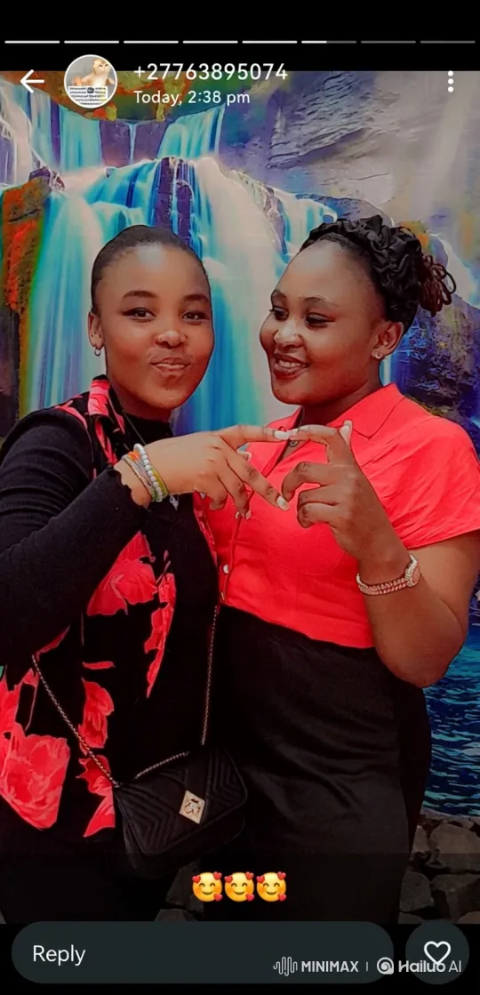 Young Women Celebrate Friendship with Heart-Shaped Handhold in Front of Painted Waterfall – AI Generated Video | Hailuo AI