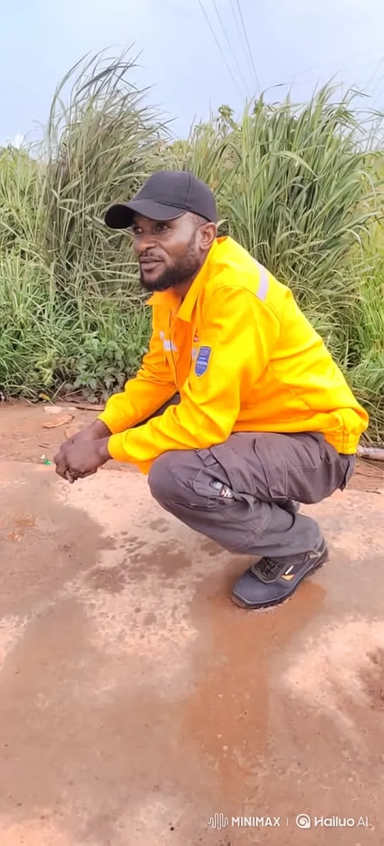 Man in Yellow Jacket Stands Up in Grassland – AI Generated Video | Hailuo AI