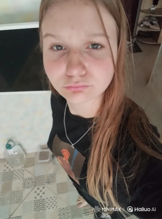 Young Woman Dancing Softly in Graphic T-Shirt – AI Generated Video | Hailuo AI