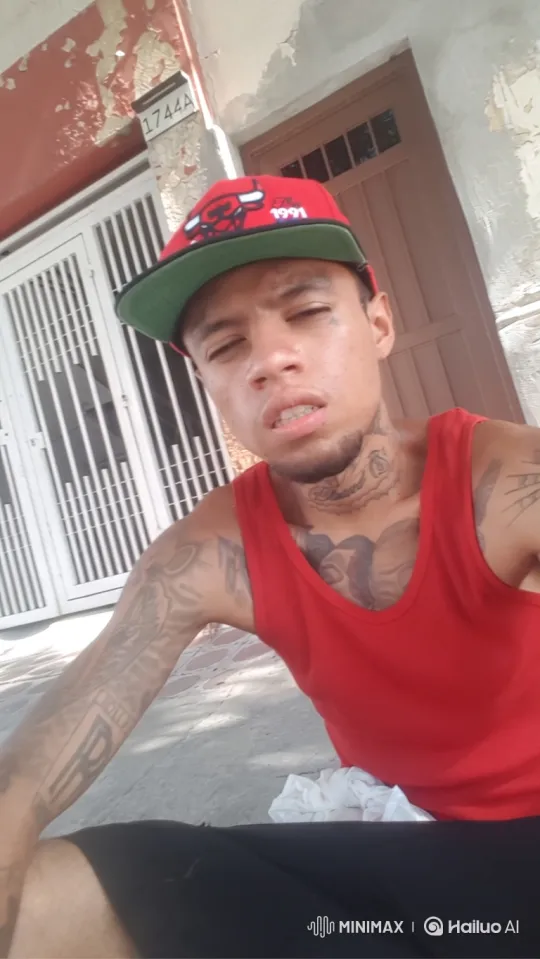 Young Man with Tattoos in Arched Camera Shot – AI Generated Video | Hailuo AI