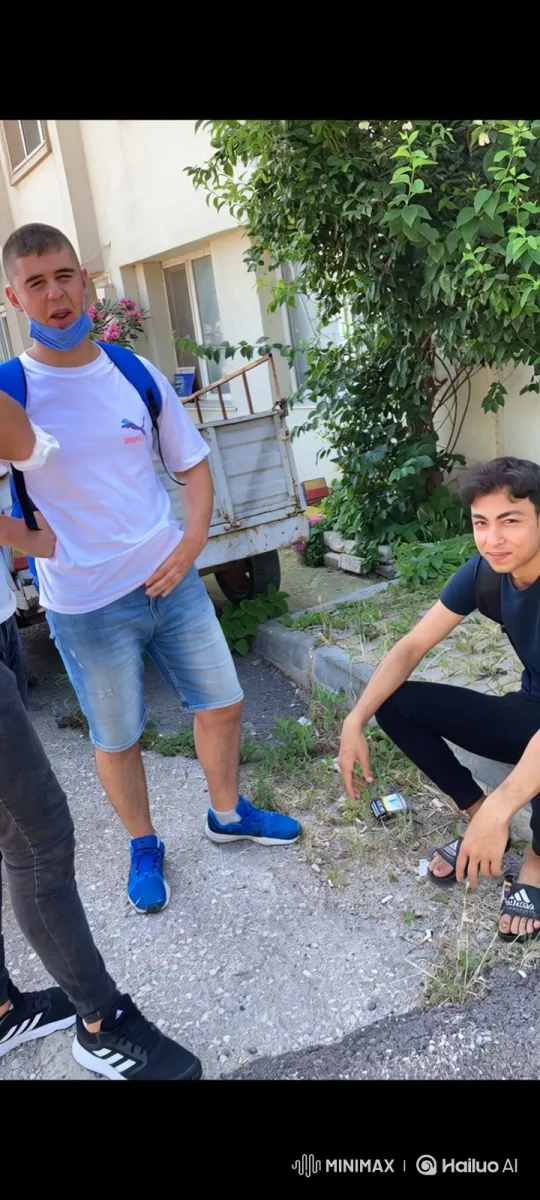 Young Men Share Tender Kiss on Gravel Path – AI Generated Video | Hailuo AI