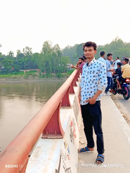 Young Couple Shares a Moment on a Bridge Overlooking a River – AI Generated Video | Hailuo AI