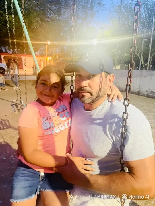 Heartwarming Father-Daughter Embrace in Dusk Park – AI Generated Video | Hailuo AI