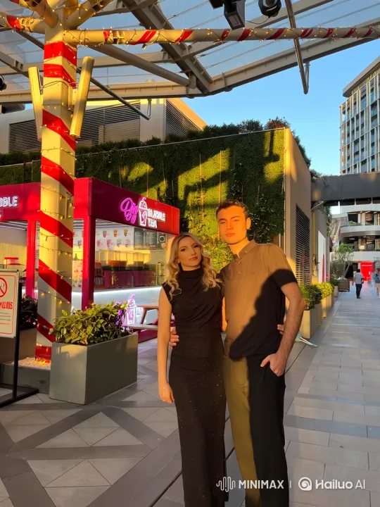 Couple Reunites with Child in Joyful Plaza Embrace – AI Generated Video | Hailuo AI