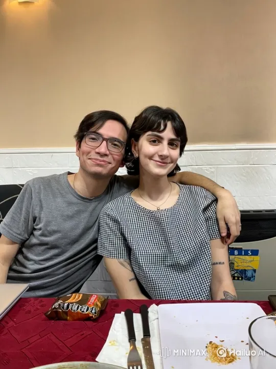 Family Portrait: Young Couple and Their Child Share a Tender Moment – AI Generated Video | Hailuo AI