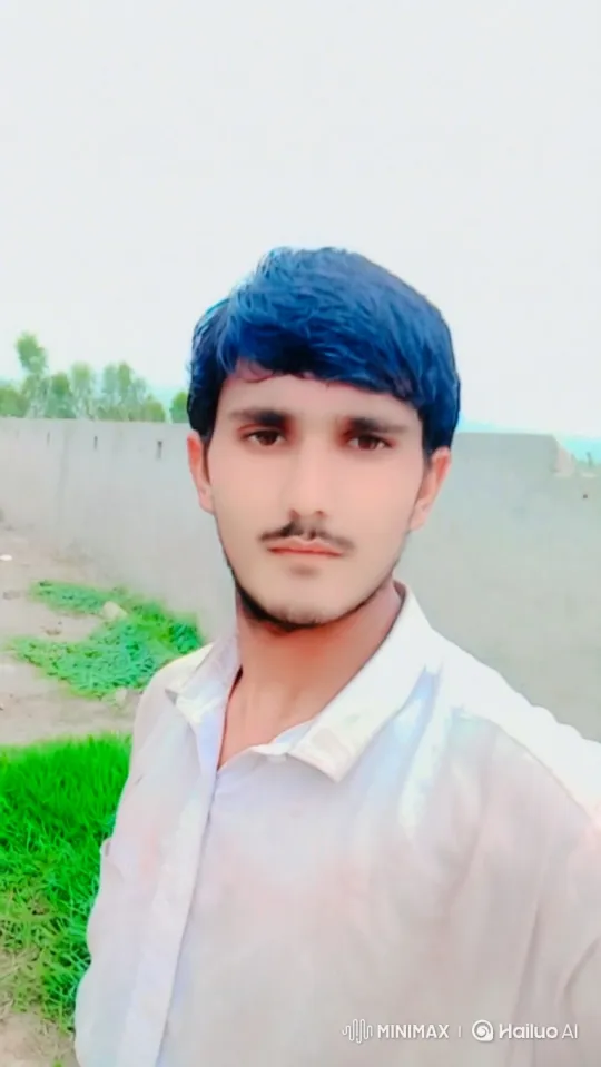 Young Man Engages with Futuristic AI Interface – AI Generated Video | Hailuo AI