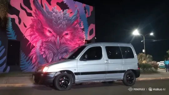 Silver Van Transforms with Low Suspension, Nighttime Owl Mural Backdrop – AI Generated Video | Hailuo AI