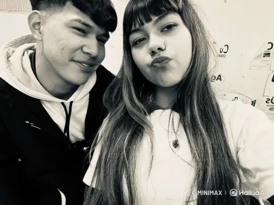 Young Family Embraces on Cobblestone Street – AI Generated Video | Hailuo AI