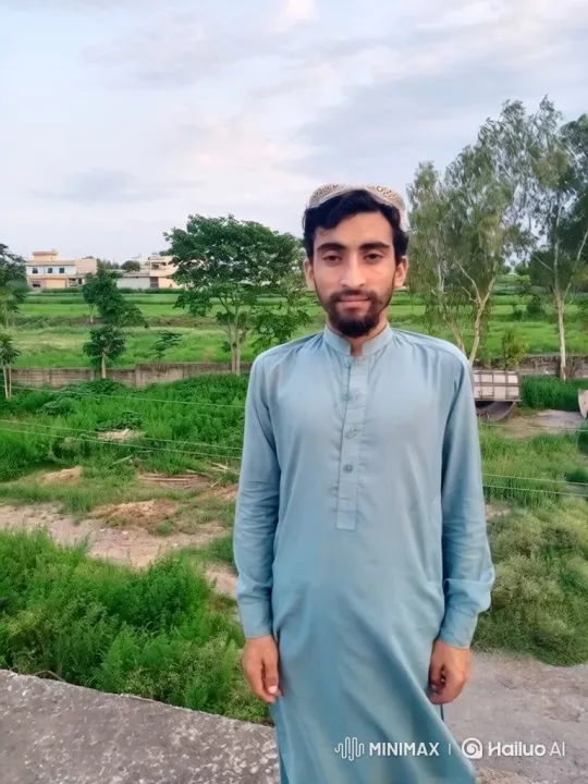 Tranquil Portrait of a Young Man Amidst Nature – AI Generated Video | Hailuo AI