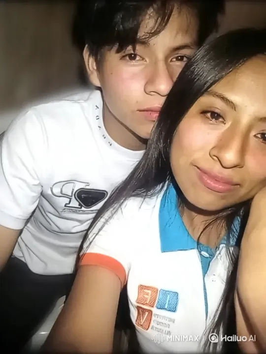 Young Family Shares Loving Embrace in Dimly Lit Scene – AI Generated Video | Hailuo AI