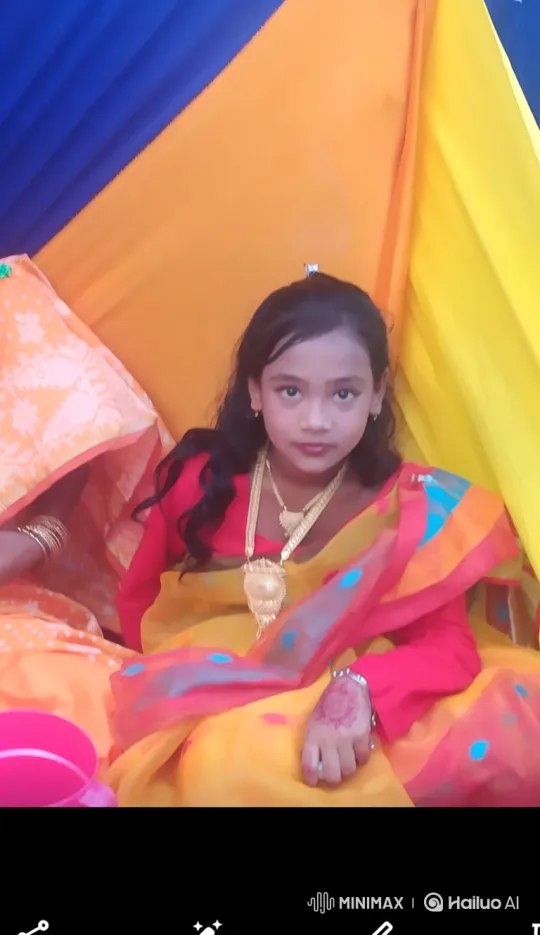 Young Girl in Traditional Attire with Serene Smile – AI Generated Video | Hailuo AI