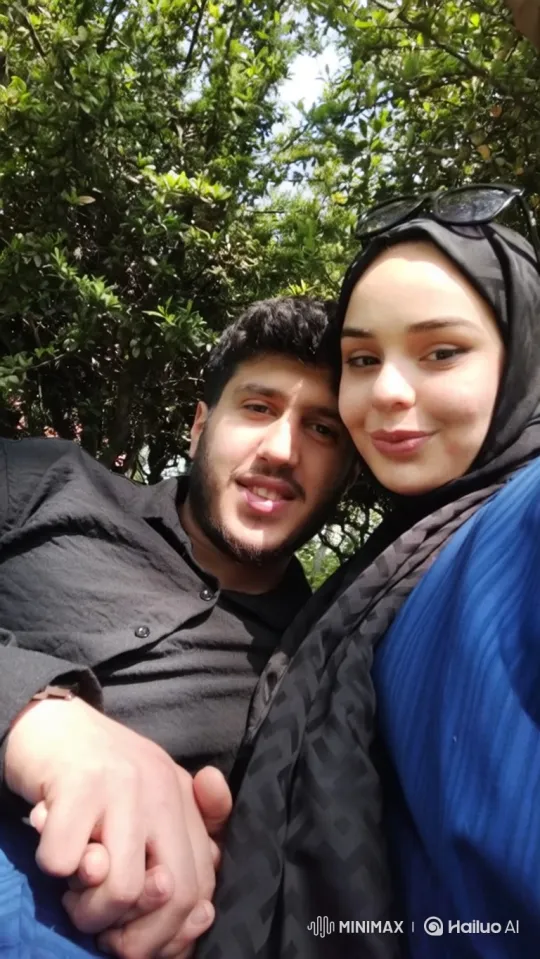 Family Portrait: Couple and Child Embrace in Sunlit Park – AI Generated Video | Hailuo AI