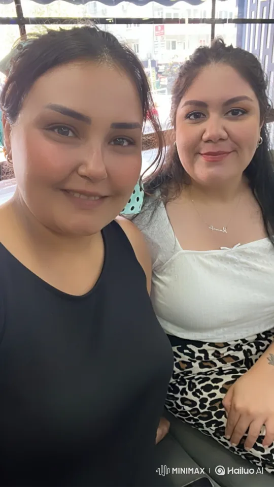 Two Women Sharing an Intimate Friendship Embrace – AI Generated Video | Hailuo AI