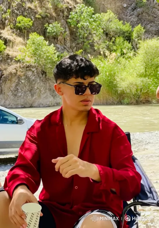 Young Father and Son Embrace by the River – AI Generated Video | Hailuo AI