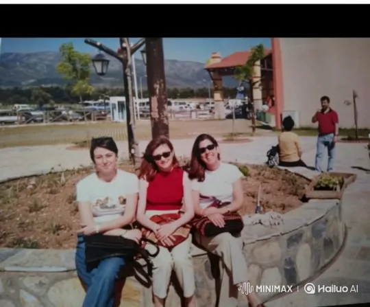 Three Friends Share a Joyful Hug on a Sunny Day – AI Generated Video | Hailuo AI