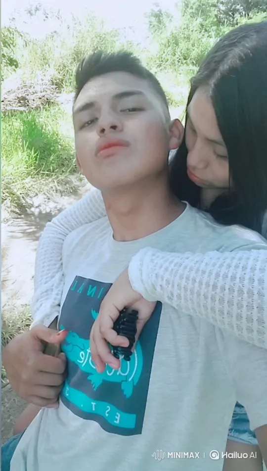 Family Embrace: Couple and Child's Loving Bond – AI Generated Video | Hailuo AI
