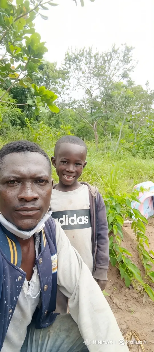 Man and Boy in Rural Setting with Pickup Truck – AI Generated Video | Hailuo AI